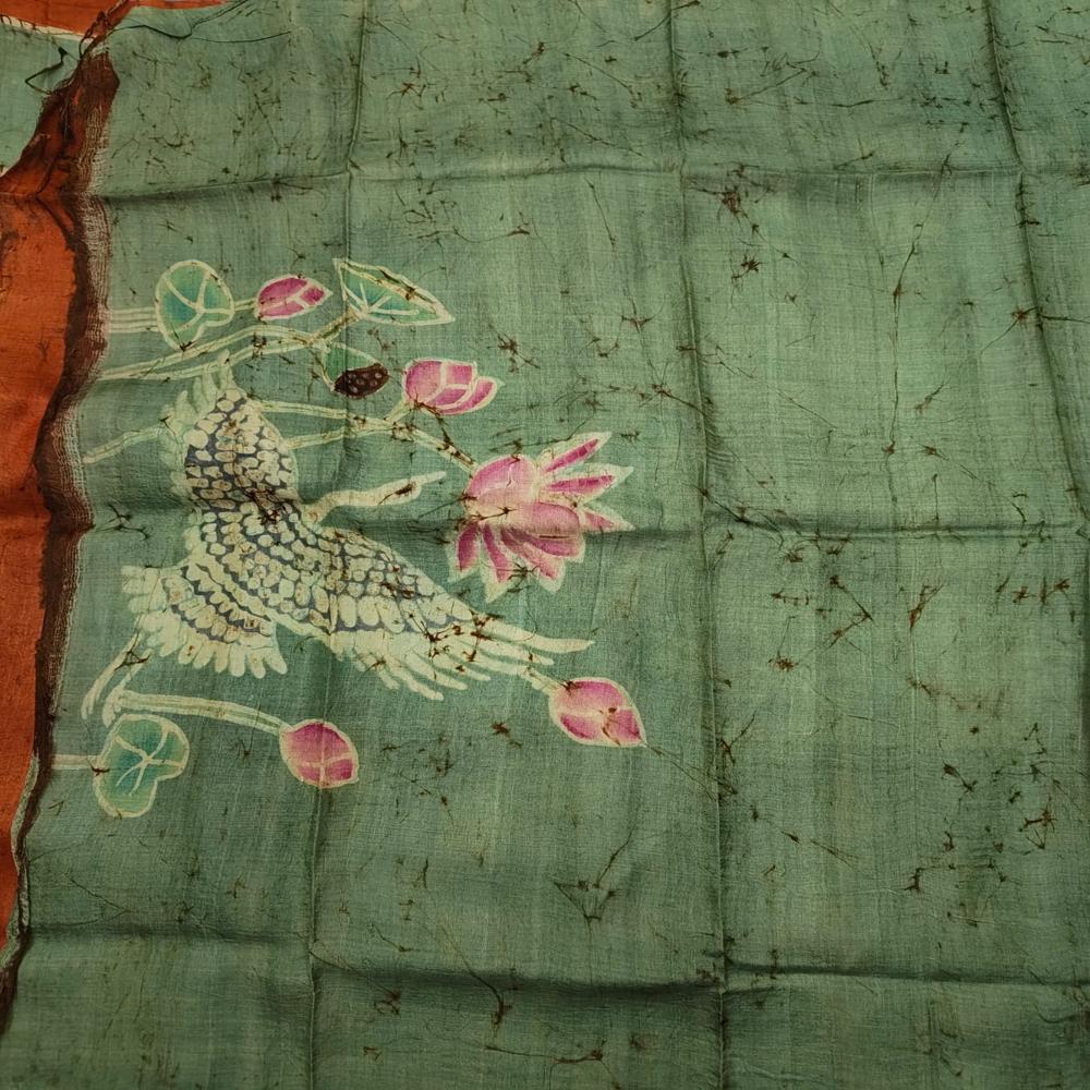 Hand batik on green Tussar saree 