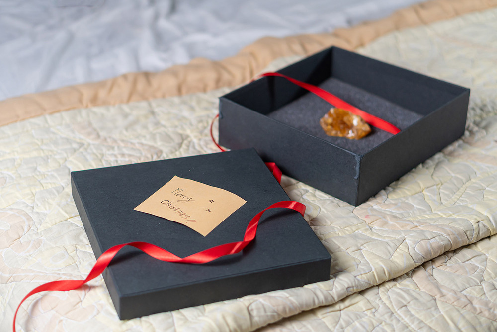 Elegant Black Gift Box With Red Ribbon