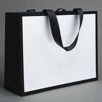 White And Black Carry Bags - Length: Approximately 16 Inches