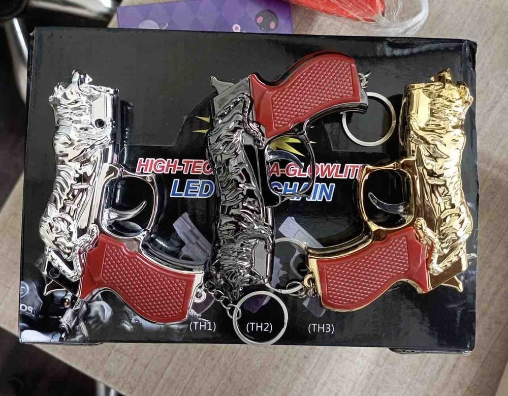 15 Pcs Lion Gun Laser Key Chain Box