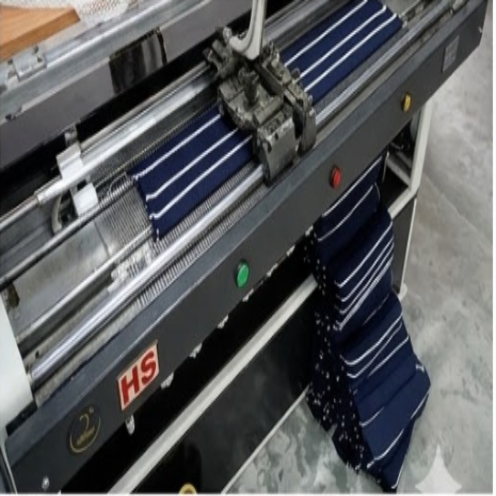 14 Semi Computerizes Flat Knitting Machine - Color: Sliver