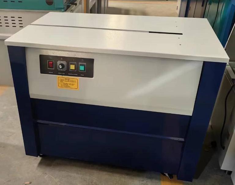 Box Strapping Machine