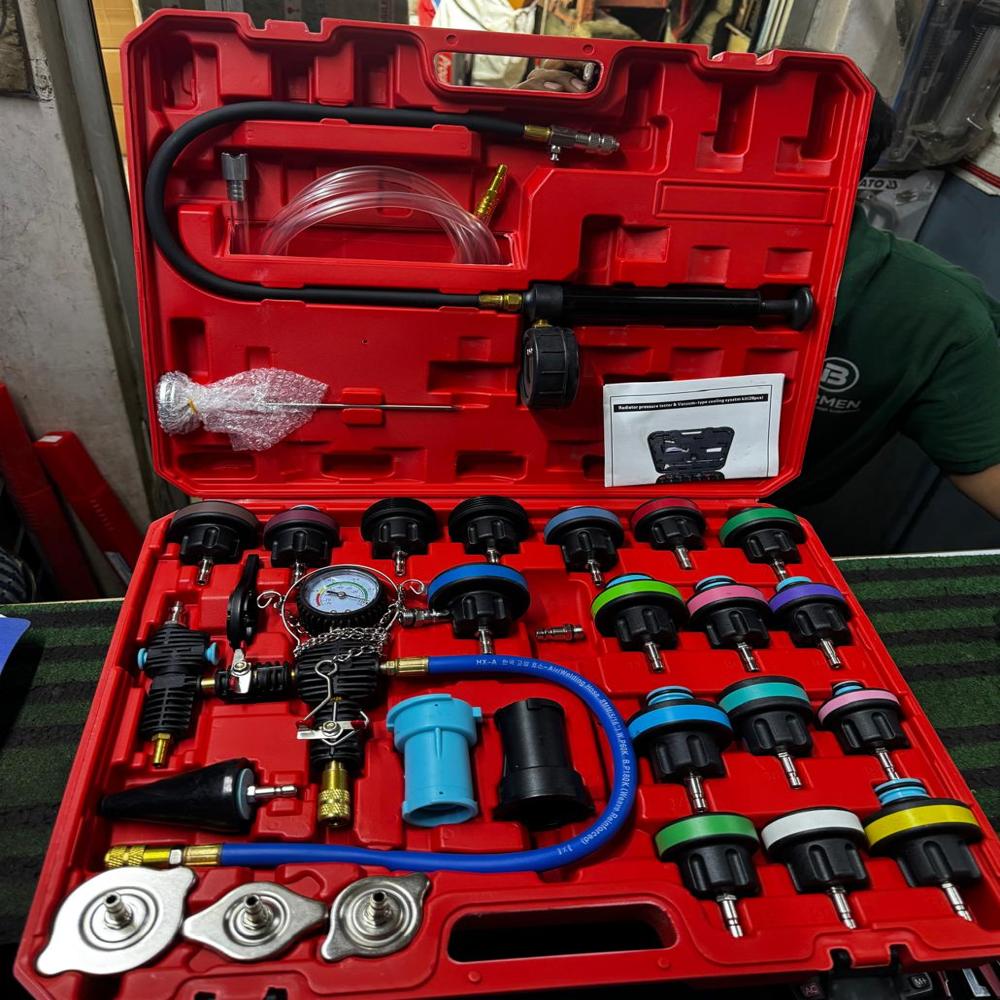 Radiator cap and cooling system tester