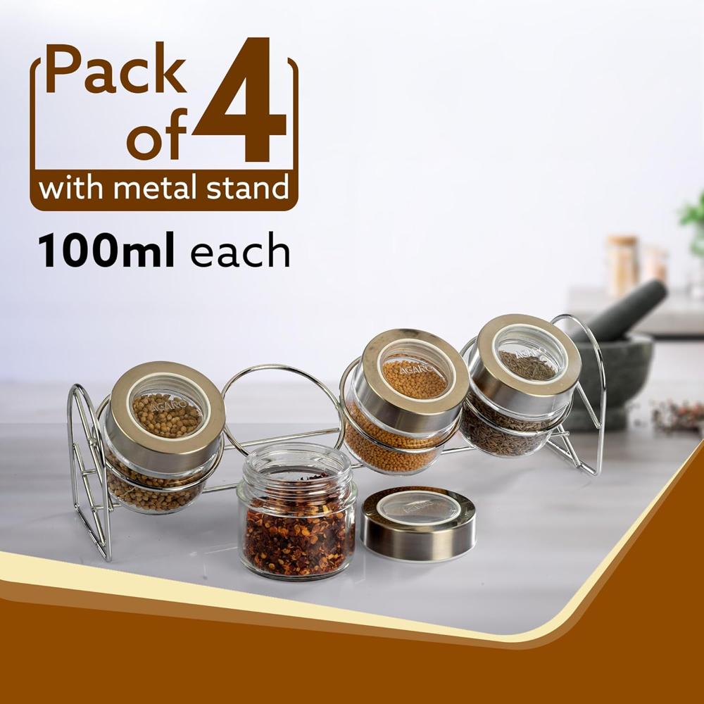 AGARO Elegant Glass Spice Jar with Metal Stand, Pack of 4, 100Ml Each, Spice storage box, kitchen organizer, spice containers, masala box for kitchen, Steel lid with transparent plastic, Transparent  34059