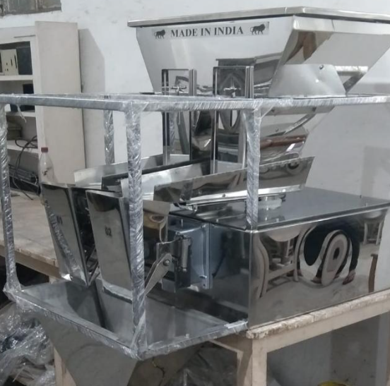 AUTOMATIC WEIGHING PACKAGING MACHINE
