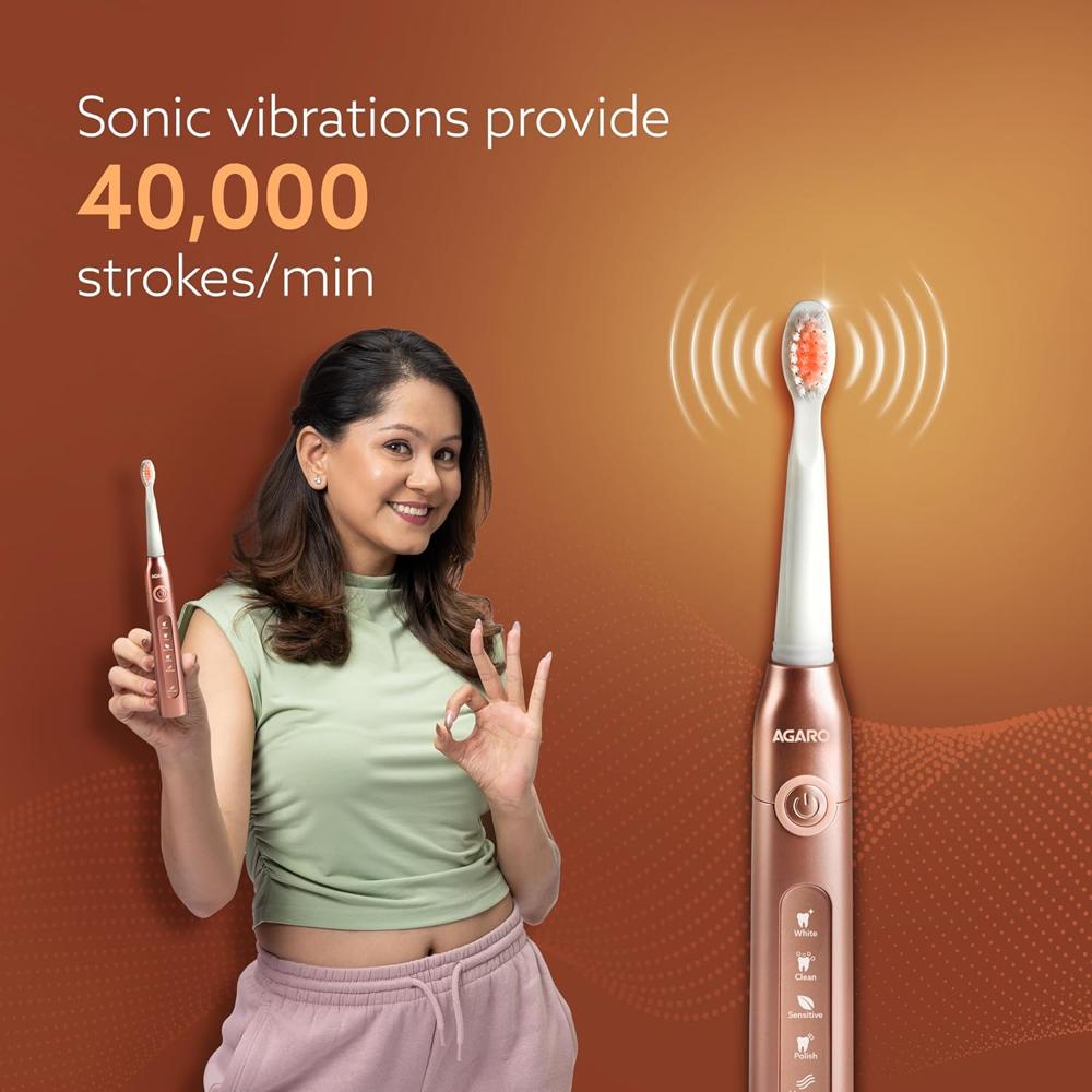 AGARO COSMIC PLUS Sonic Electric Tooth Brush For Adults with 5 Modes, 5 Brush Heads, 1 Interdental Head, Carry Case & Rechargeable with 4 Hours Charge Lasting Up to 25 Days, Power Toothbrush, (Rosegold) 3352