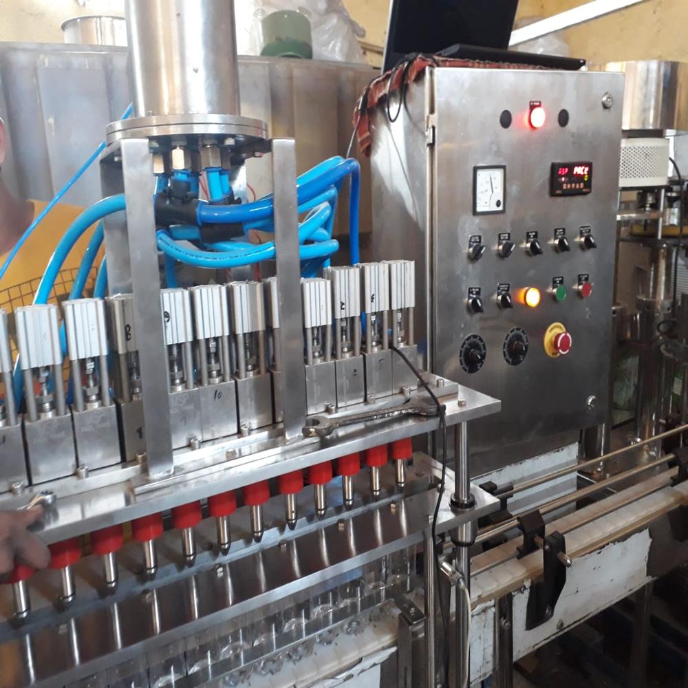 Automatic Liquid Packaging Machine - Stainless Steel, 1050x870x1200mm Size, Silver Color | High Performance, Noise Less Operation, Automatic Grade