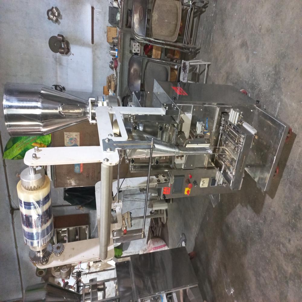 Pneumatic Pouch Packing Machine - Stainless Steel, 750mm(l) X 560mm(w) X 1750mm(h), White | Automatic, 5-500 Grams Filling Range, High Efficiency