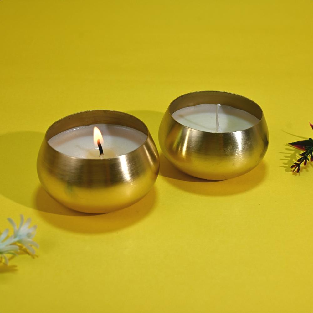 Small metal bowl candle