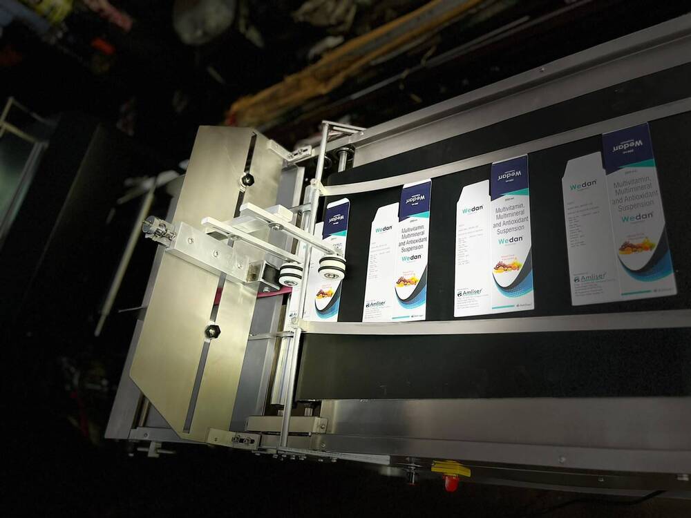 Brochure Feeding Machine