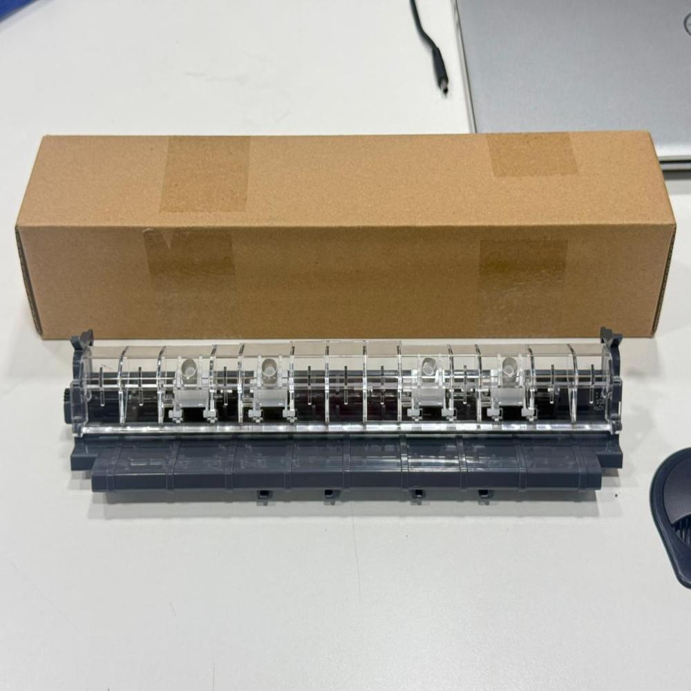 The Epson LX-310 paper cutter assembly