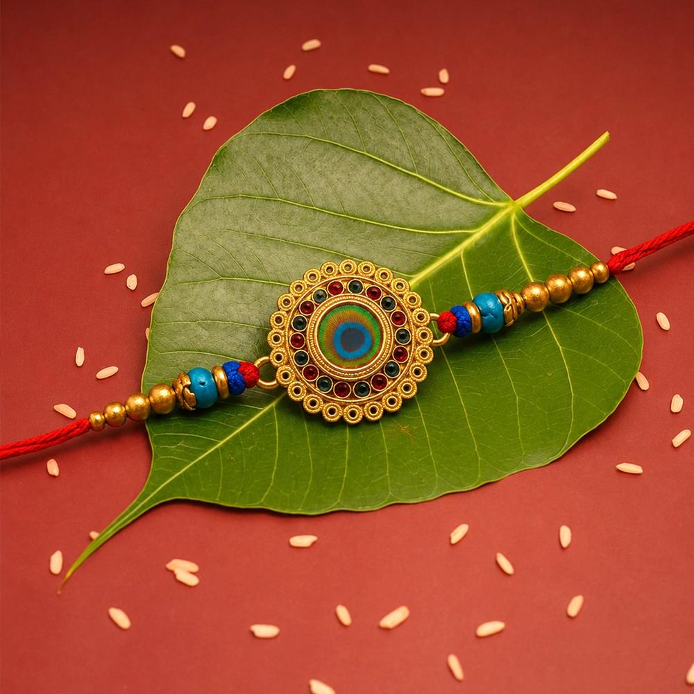 Traditional Flower Design Golden Rakhi Festive Elegance & Blessings