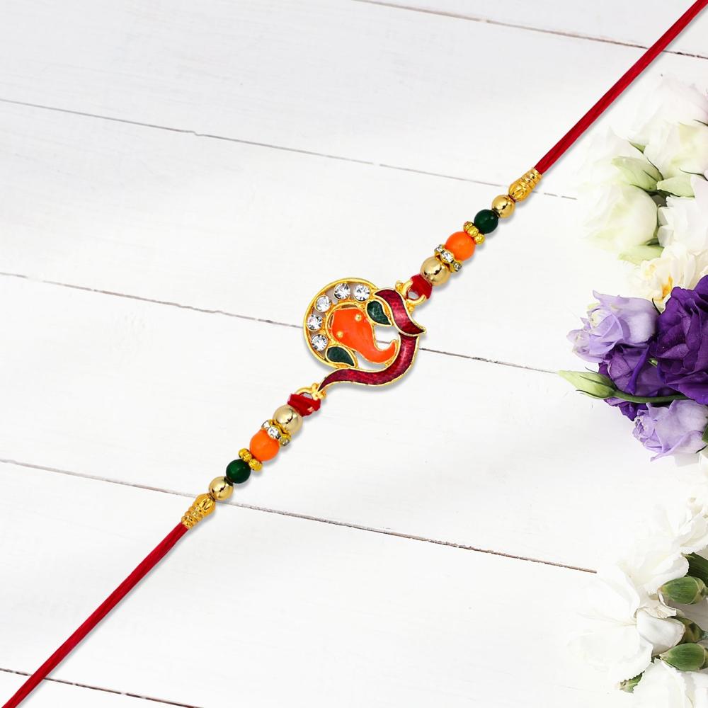 Golden Ganesha Rakhi Red Green Beads With Stone Detailing - Color: Mix