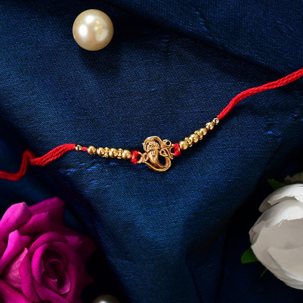 Ganesha Rakhi - Divine Blessings & Traditional Design - Color: Mix