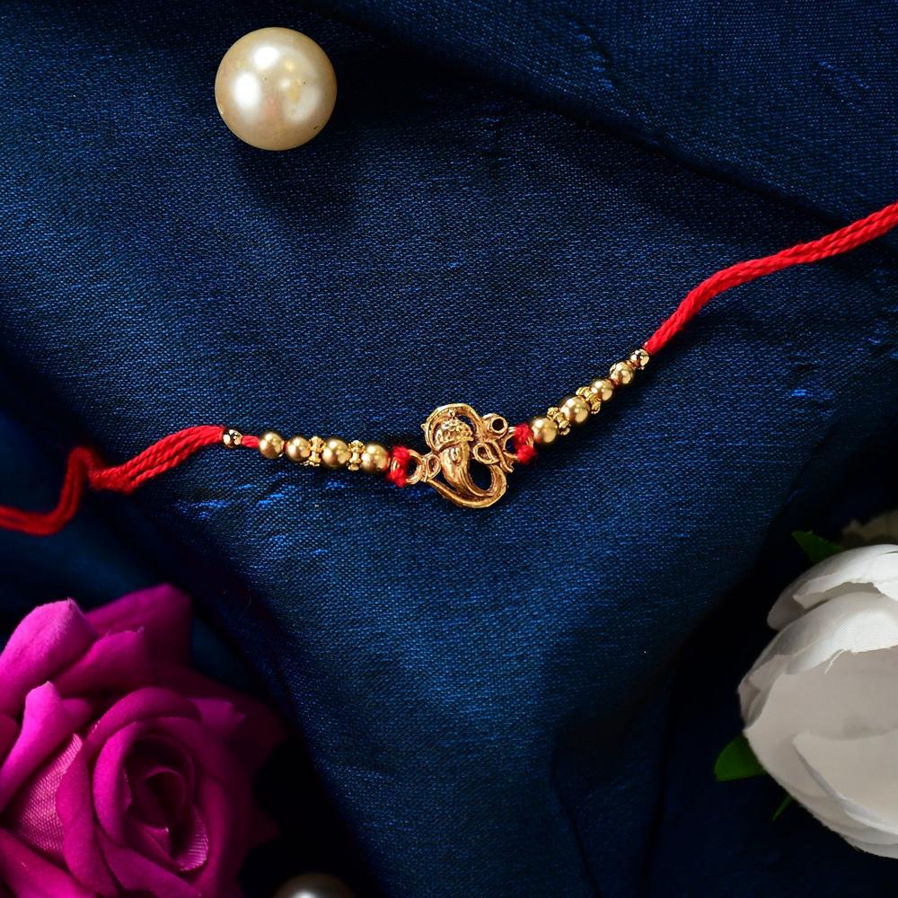 Ganesha Rakhi - Divine Blessings & Traditional Design