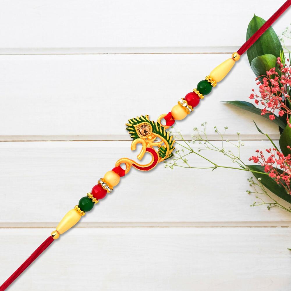 Om Peacock Feather Rakhi  Handcrafted Symbol of Protection