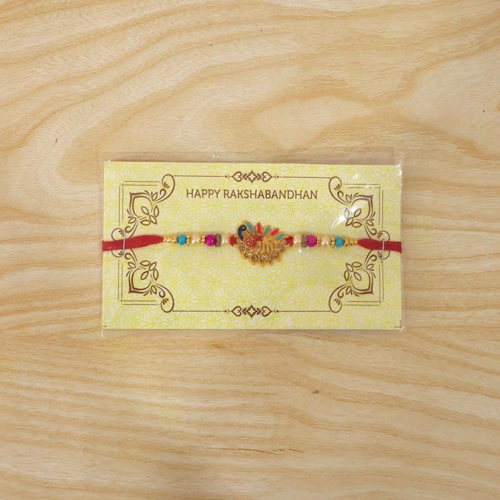 Colorful Peacock Rakhi  Elegant Festival Gift with Stones