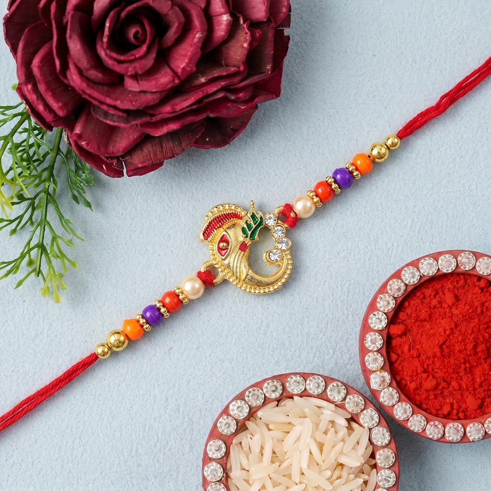 Traditional Ganesh Beaded Rakhi  Embrace Festive Bonding