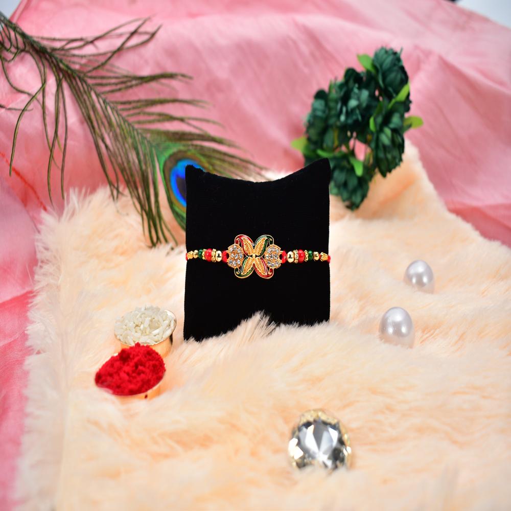 Bead Rakhi with Golden Flower Motif  Elegant & Festive Sibling Gift