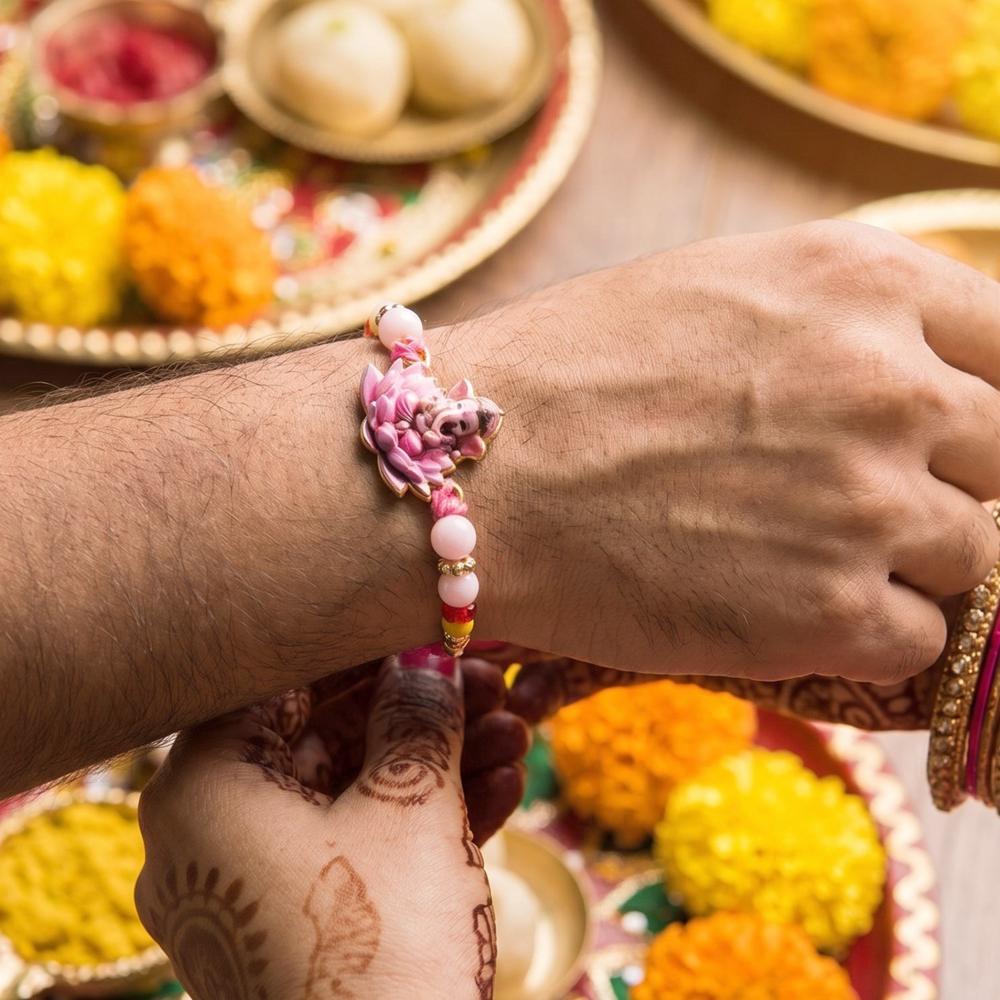Lord Ganesha Rakhi  Divine Blessings & Elegant Design