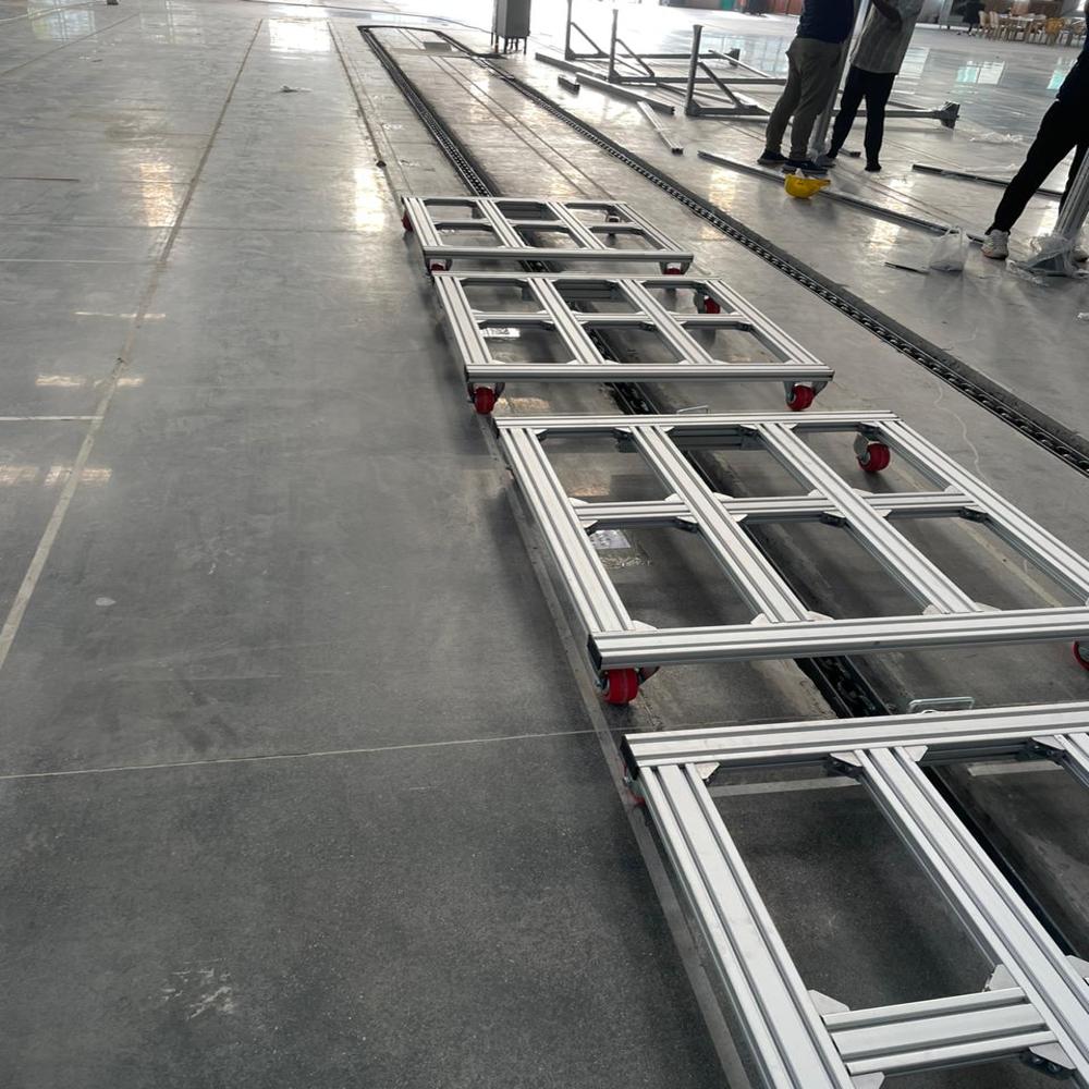 TWO LINE FLOOR CONVEYOR SYSTEM