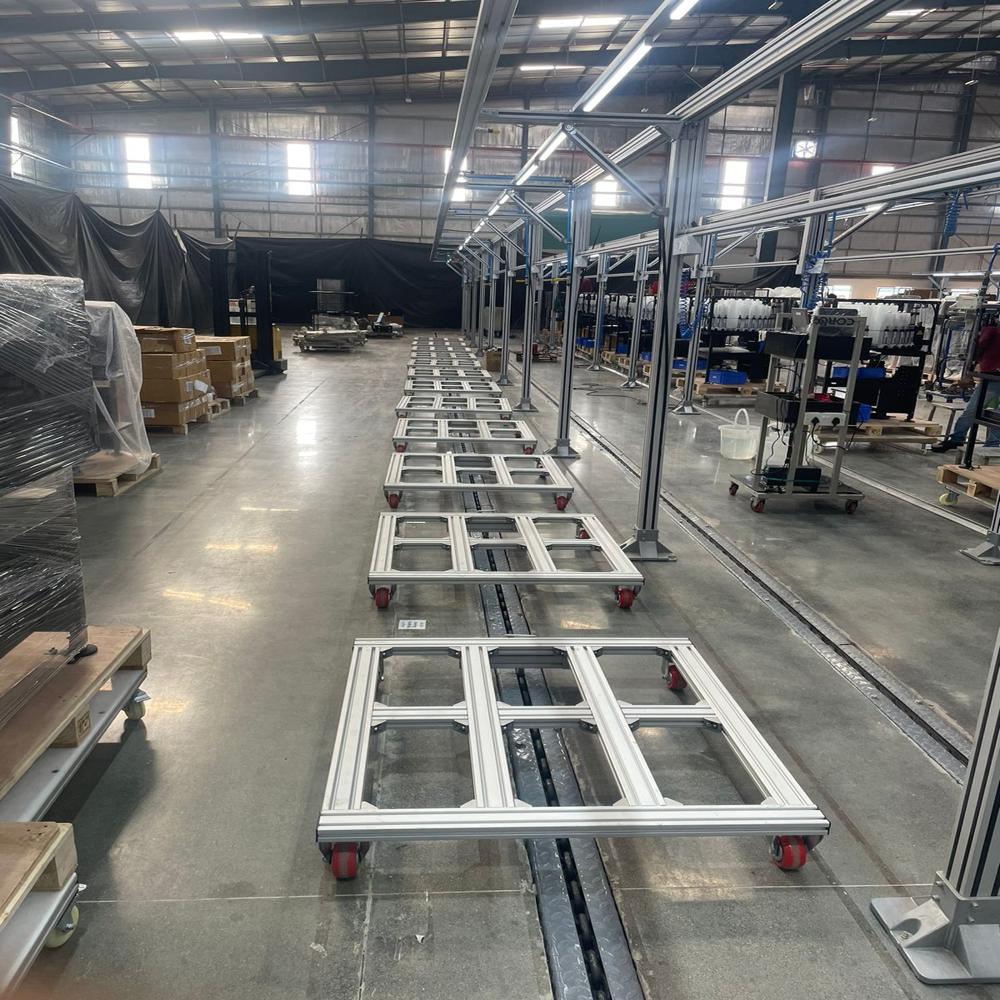 TWO LINE FLOOR CONVEYOR SYSTEM