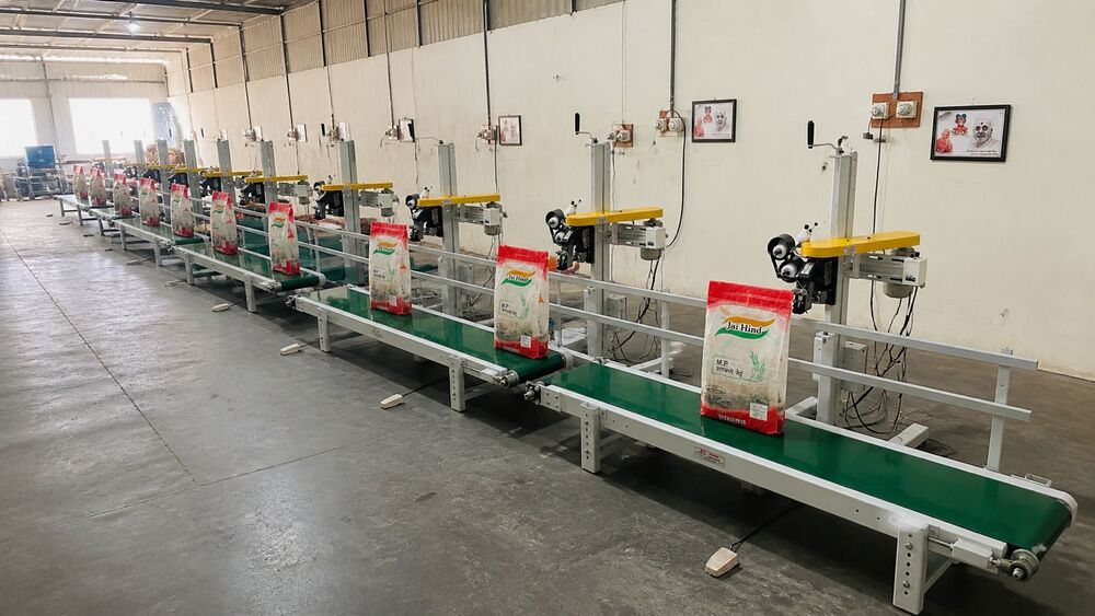 BAG CLOSING CONVEYOR MANUFACTURERS