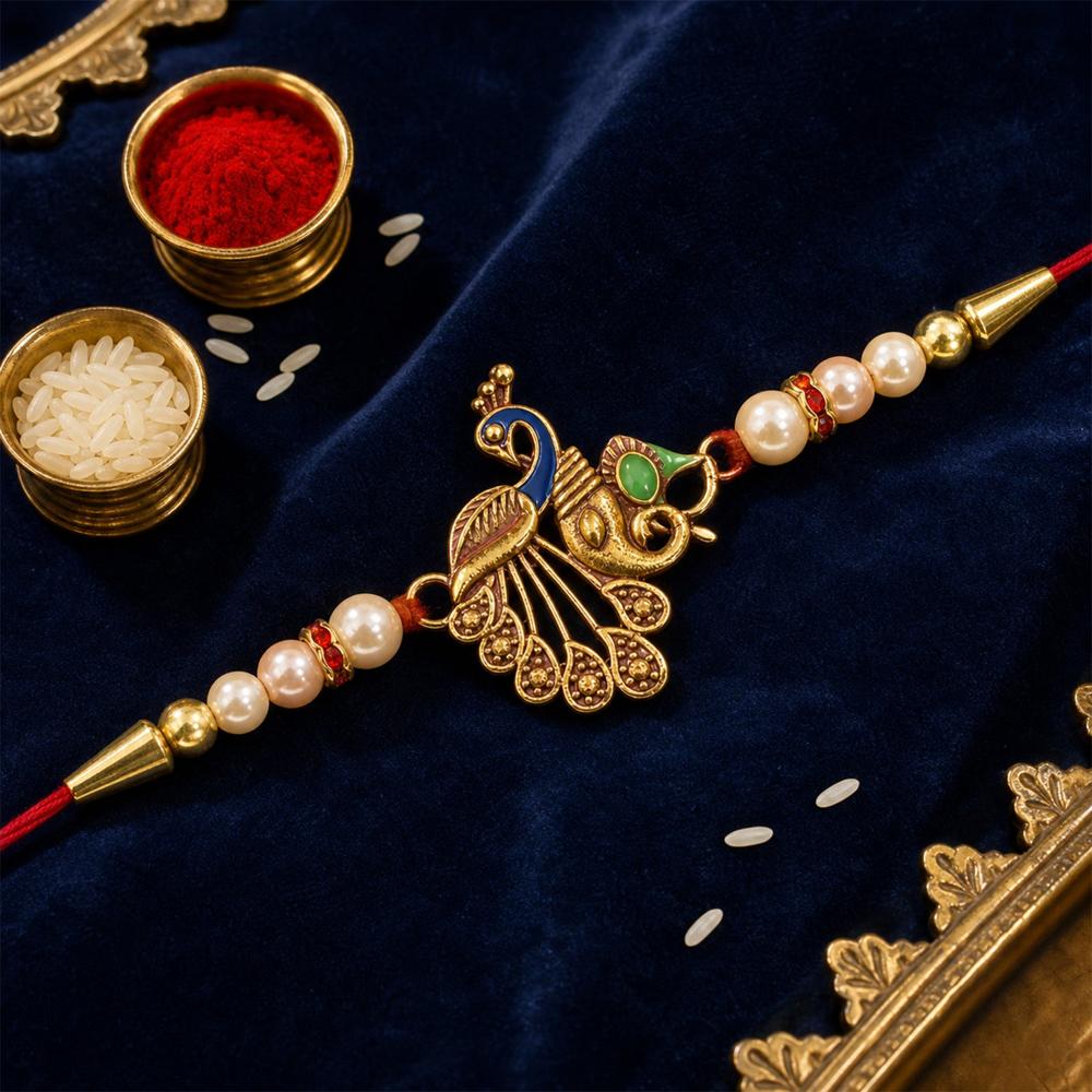 Shop Peacock Design Rakhi with Pearl Beads & Golden Detailing