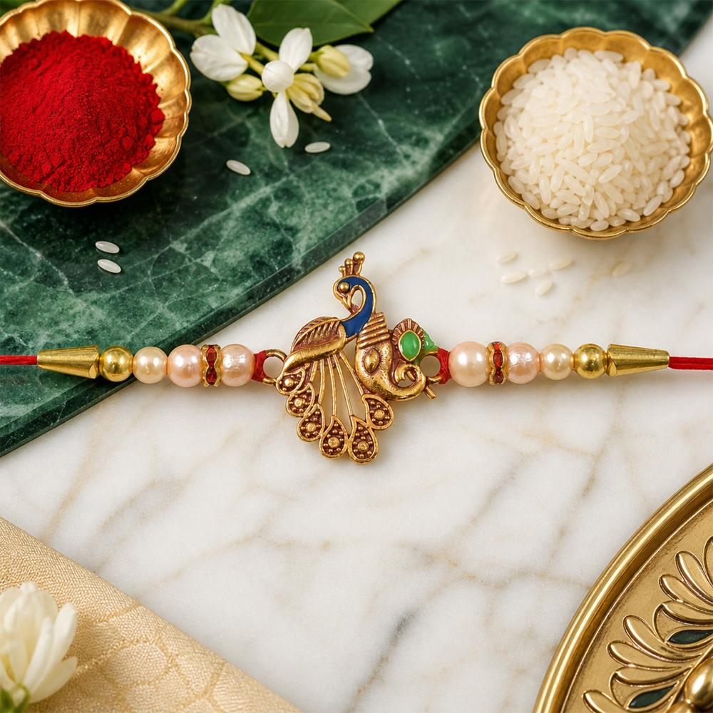 Shop Peacock Design Rakhi with Pearl Beads & Golden Detailing