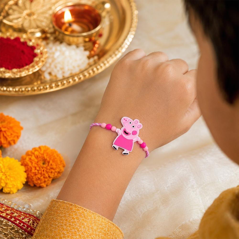 Kids' Cartoon Character Rakhi - Vibrant Pink Beads & Festive Charm