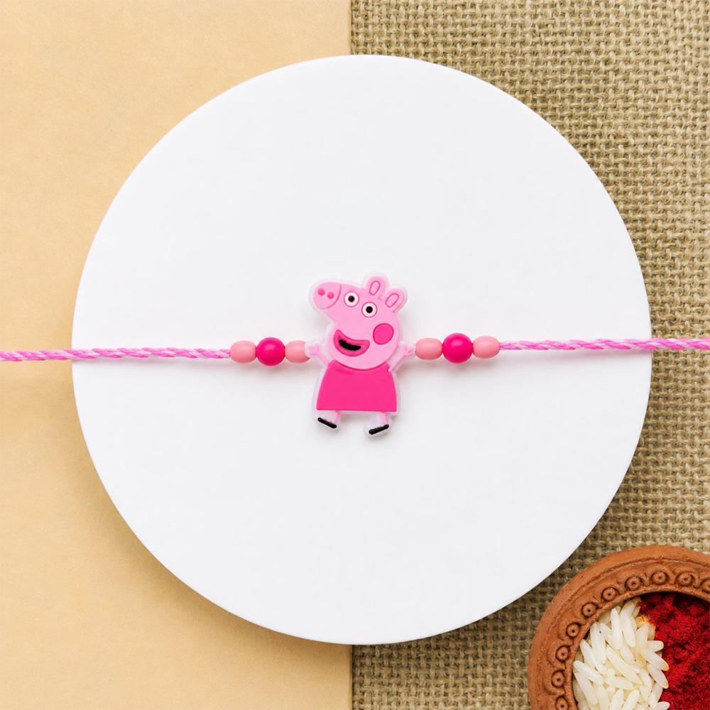 Kids' Cartoon Character Rakhi - Vibrant Pink Beads & Festive Charm