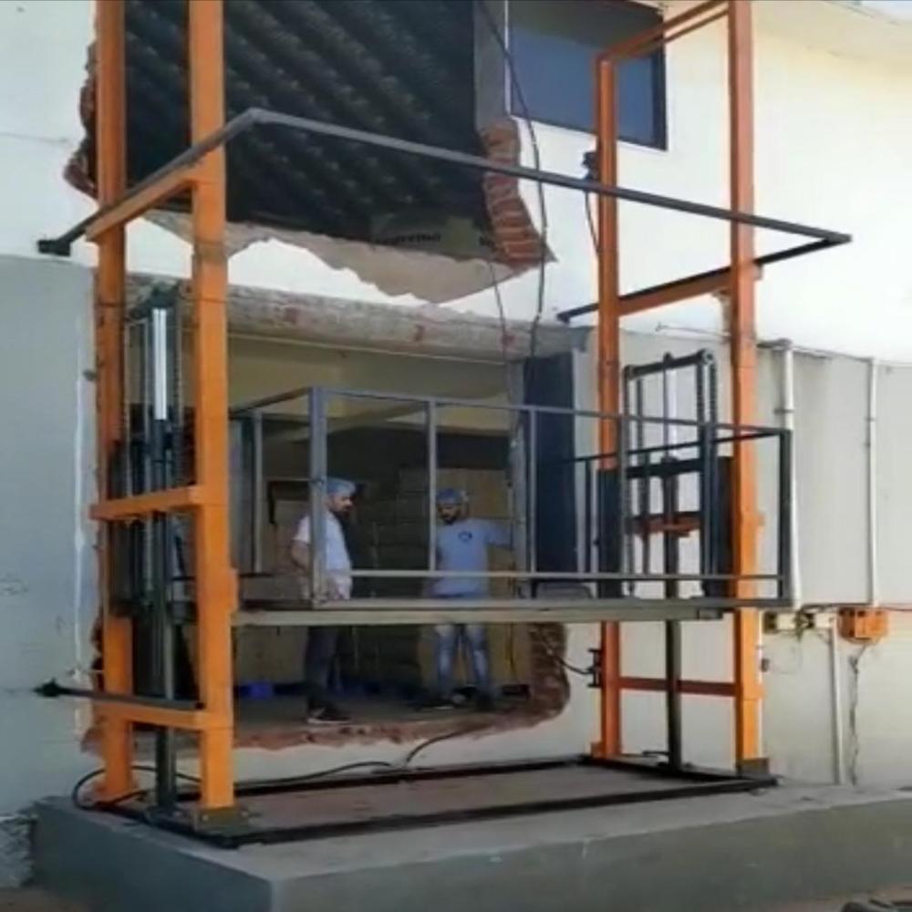 INDUSTRIAL DUAL MAST GOODS LIFT MANUFACTURER IN AHMEDABAD