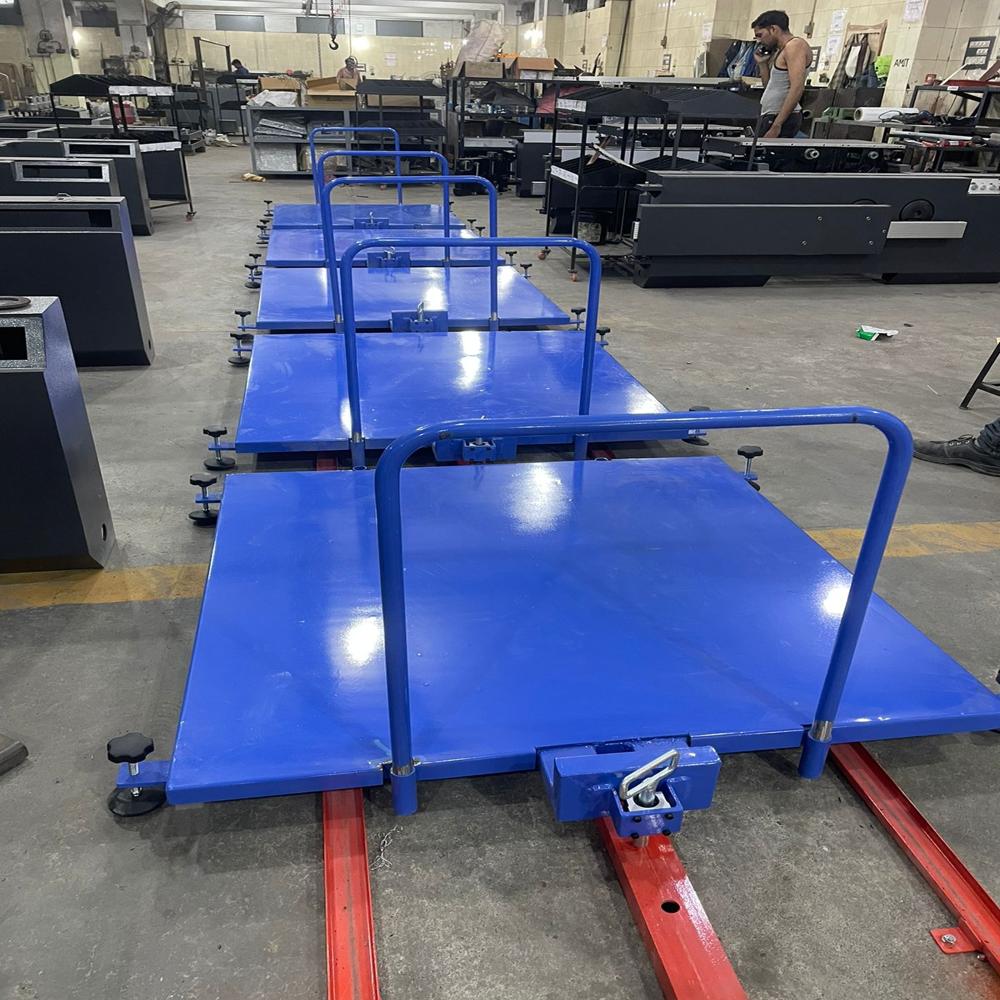 MANUAL TOW LINE FLOOR CONVEYOR SYSTEM
