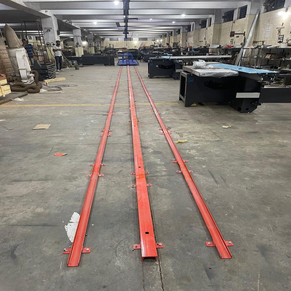 MANUAL TOW LINE FLOOR CONVEYOR SYSTEM