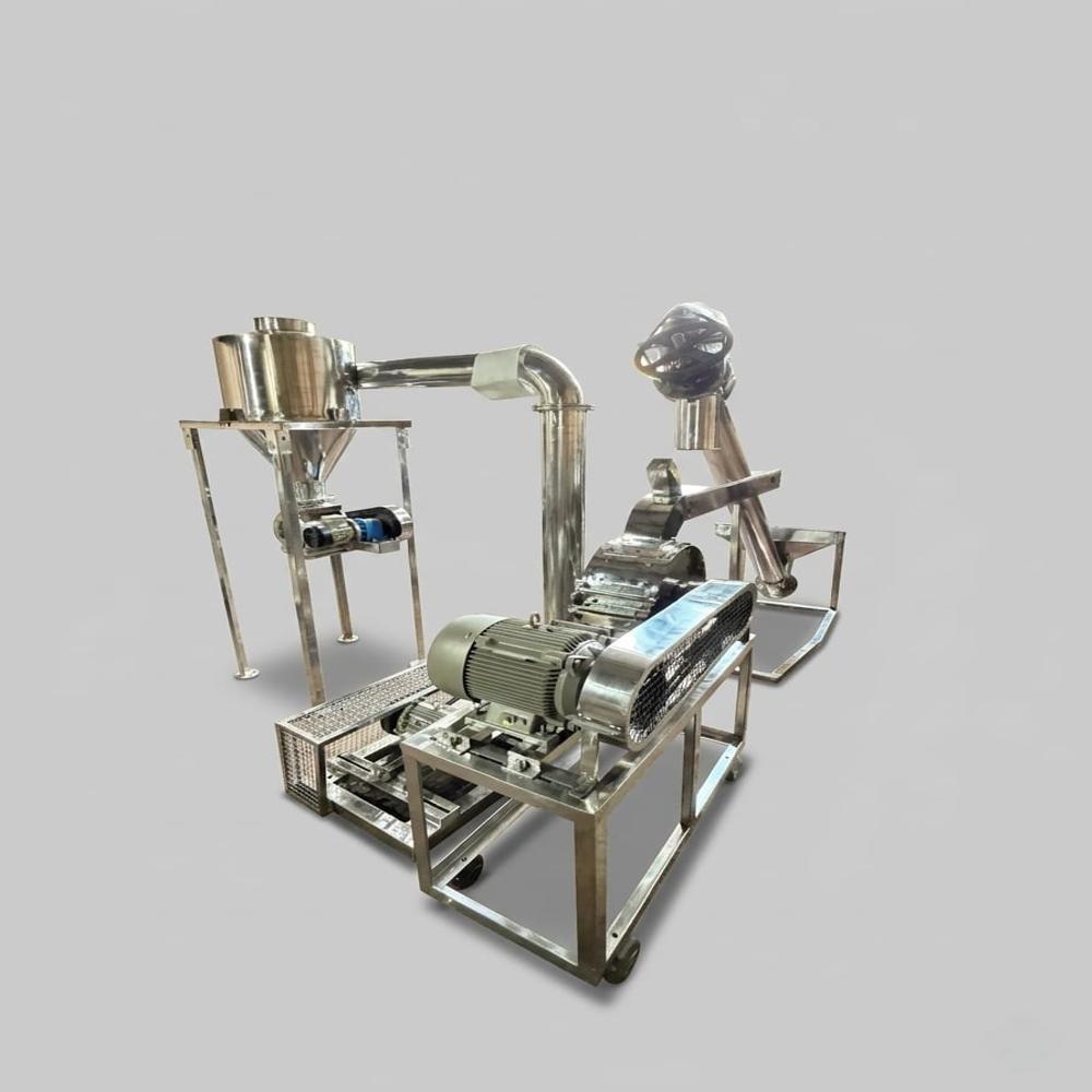 Coriander grinding machine with storage bin