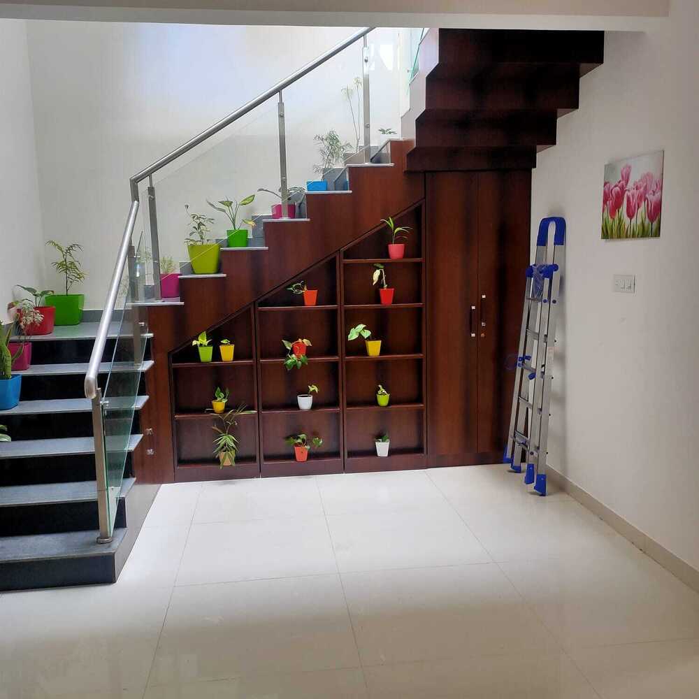 Under-Stair Custom Storage Cabinet with Open Planter Display Shelves