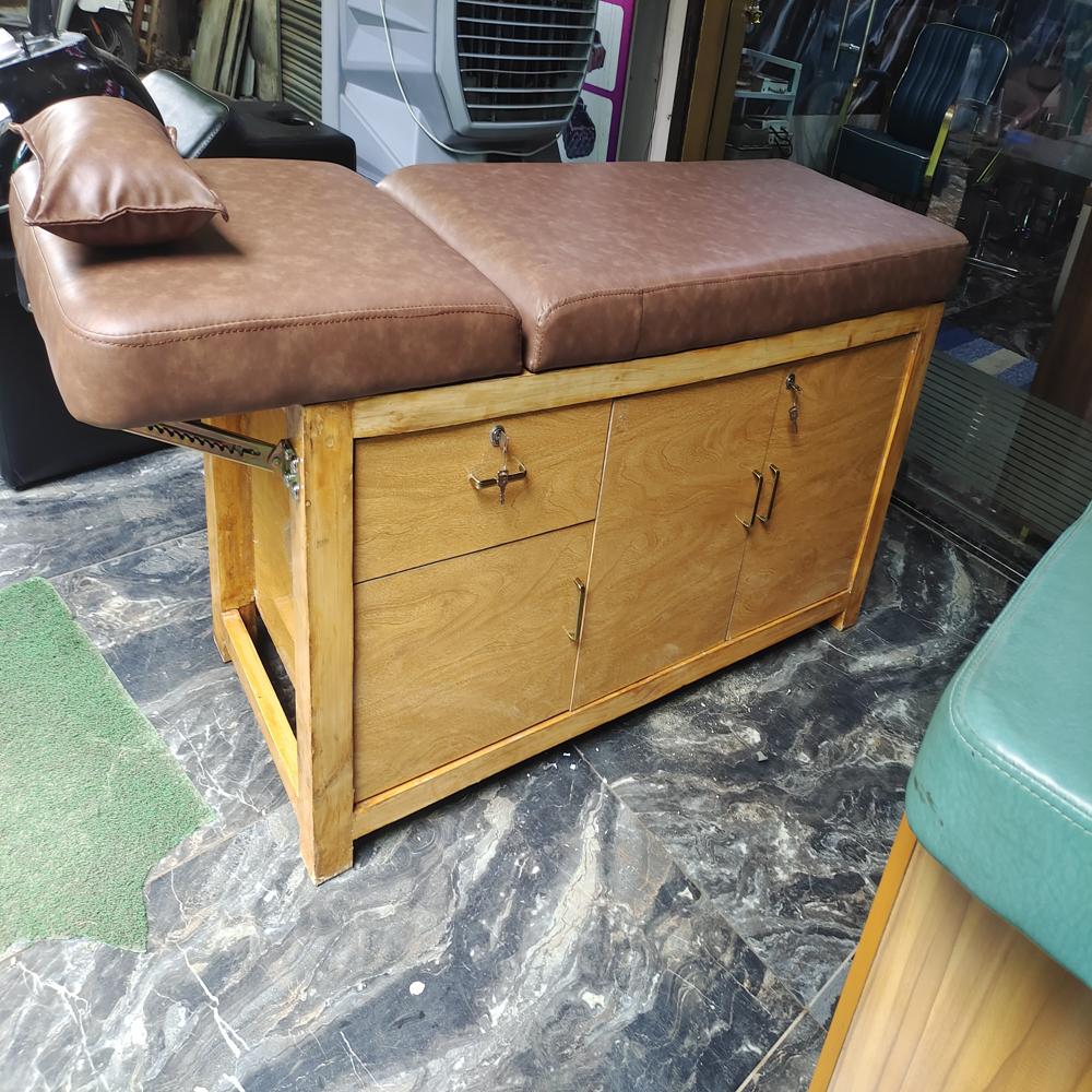 Wooden facial and spa bed