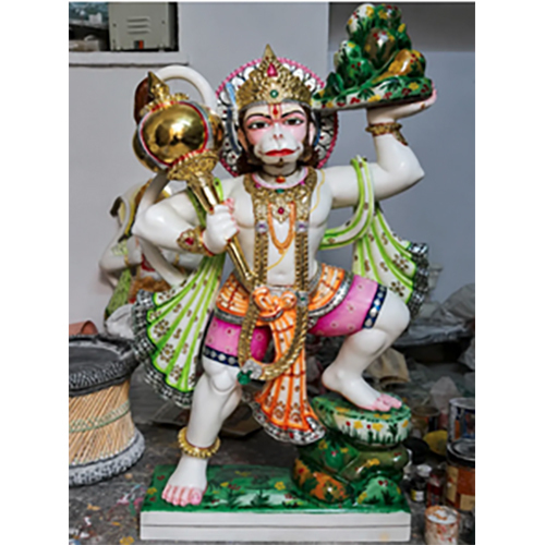 Hanuman Statue in a Colorful Workshop