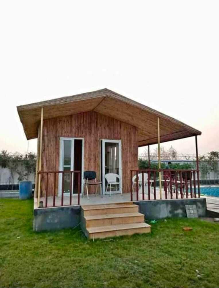 Modular Bamboo Hut - Wooden Frame With Bamboo Roof, Brown Color, Single Door, Sliding Windows, Ideal For Hotels And Restaurants, 5-10 Year Life Span