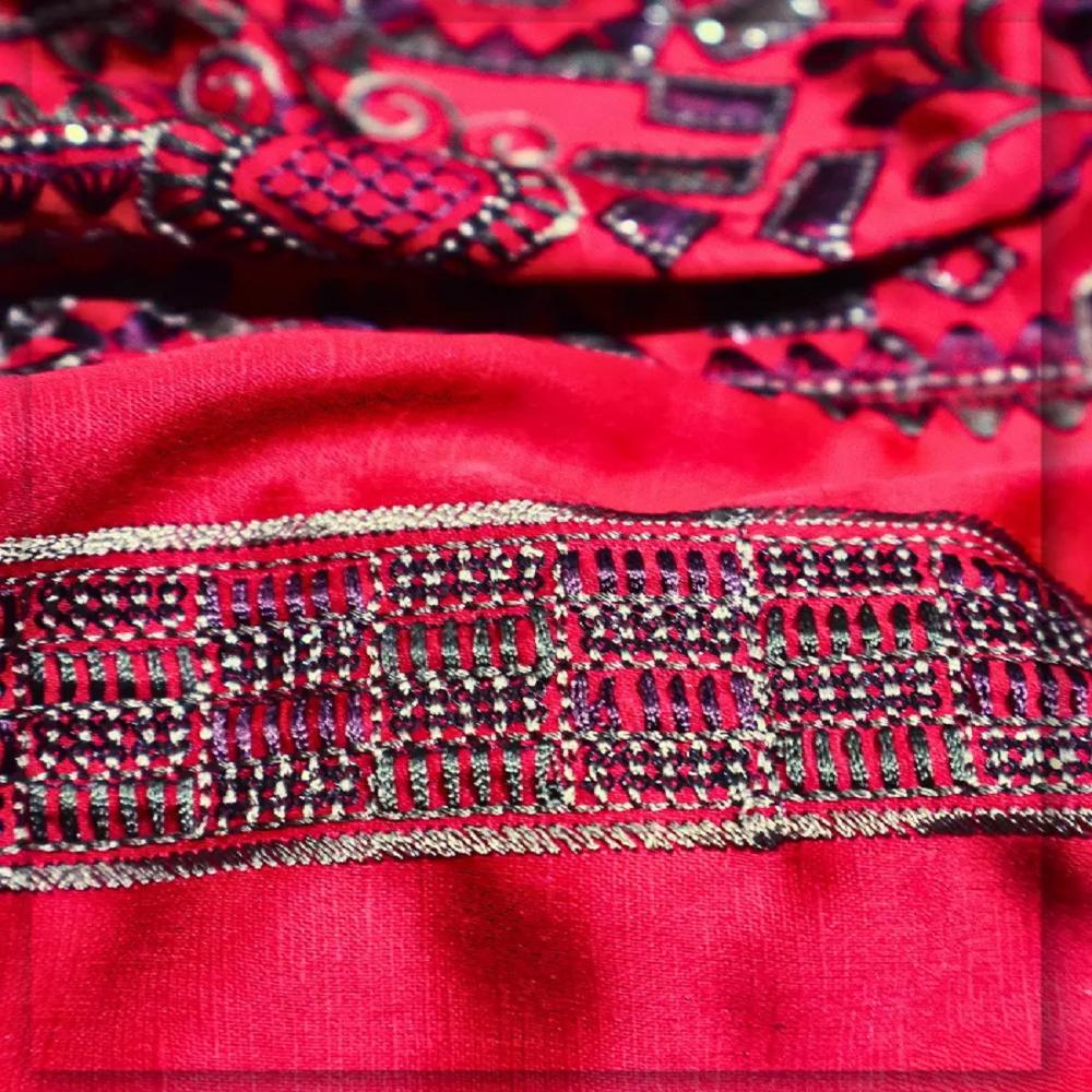 Red Linen Satin Embroidered Fabric developed for men's sherwani, weddingwear and festive occasionwear.