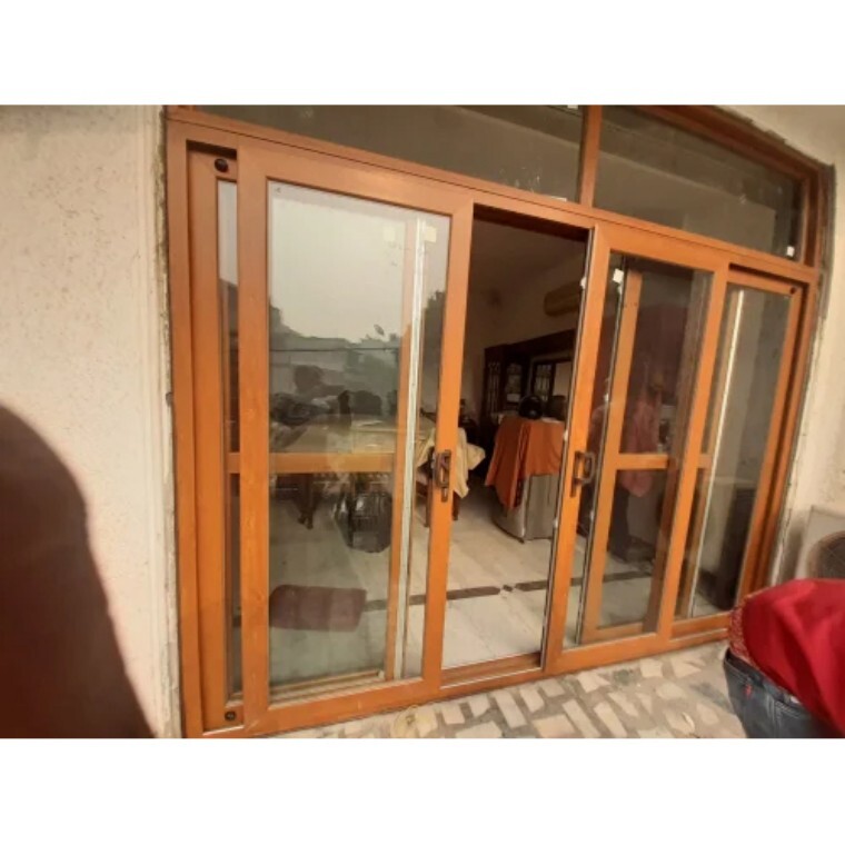 Sliding Door - Upvc Material, Brown Color , Plain Design, Powder Coated Finish, Smooth Sliding Operation For Commercial Applications