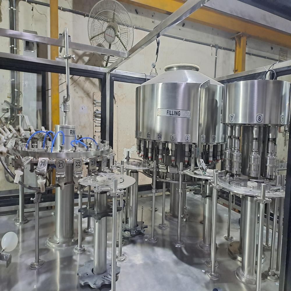 SHEC 90 BPM Water Bottle Rinsing Filling and Capping Machine