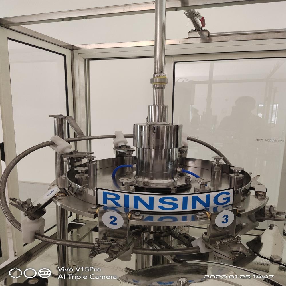 SHEC 60 BPM Water Bottle Rinsing Filling and Capping Machine