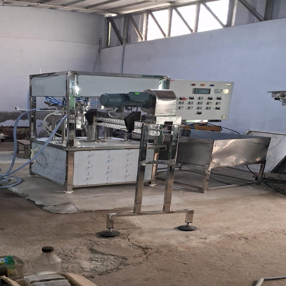 Pet bottle rotary filling and capping machine