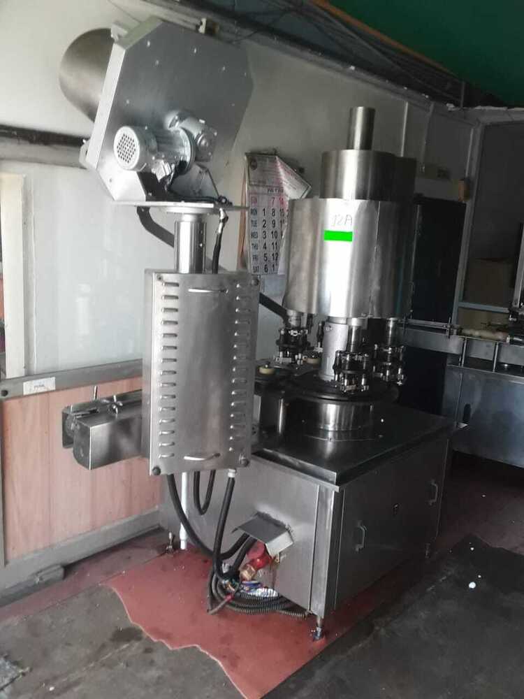 Automatic Liquid Filling and Capping Machine