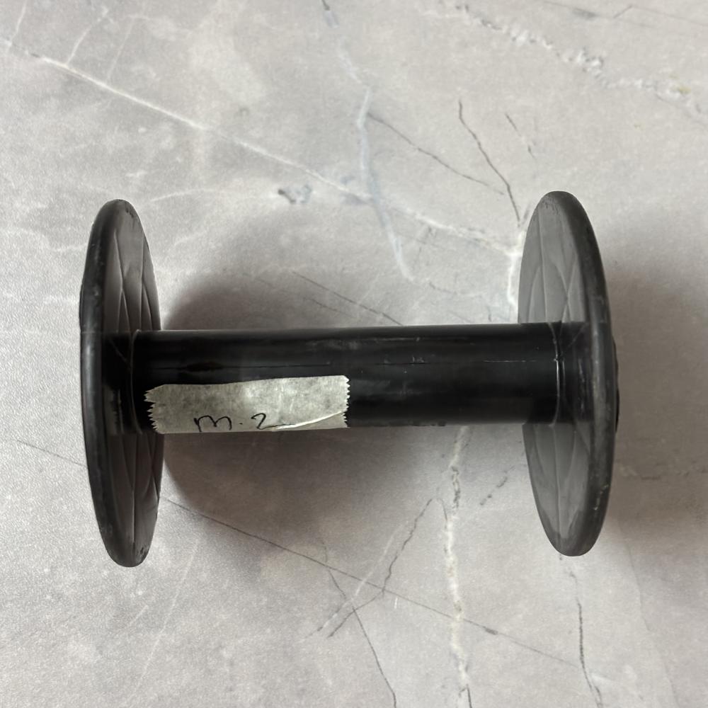 Black Plastic Bobbin - Hardness: Rigid