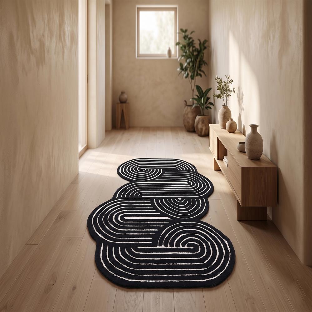 Handmade Black And Ivory Abstract Braided Rug With Unique Sculptural Loop Pattern For Modern Living Room Decor - Backing Material: Canvas Latex