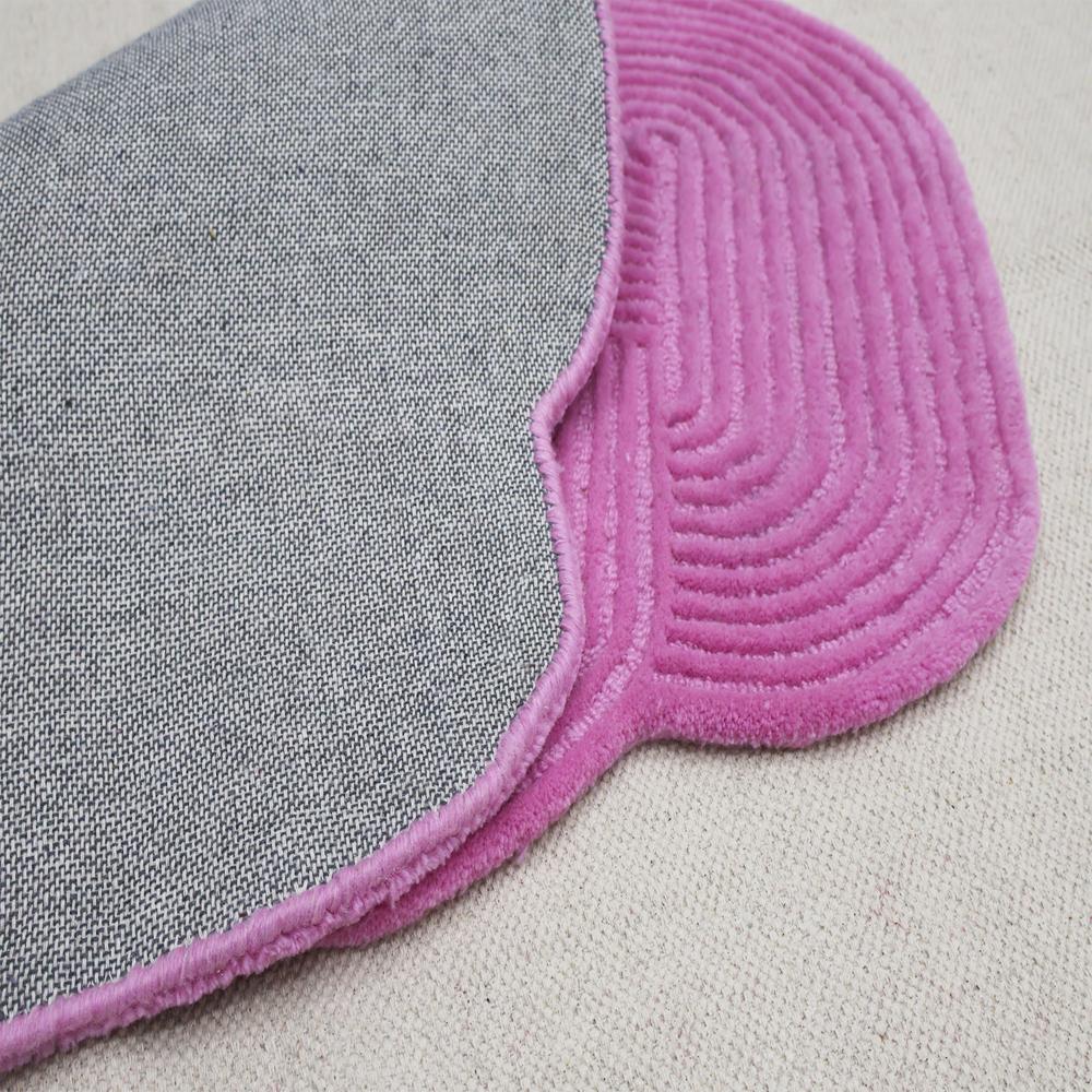 Hand Tufted Pink Wool Rug with Abstract Organic Shape and Raised Swirl Pattern for Modern Living Room and Bedroom Decor