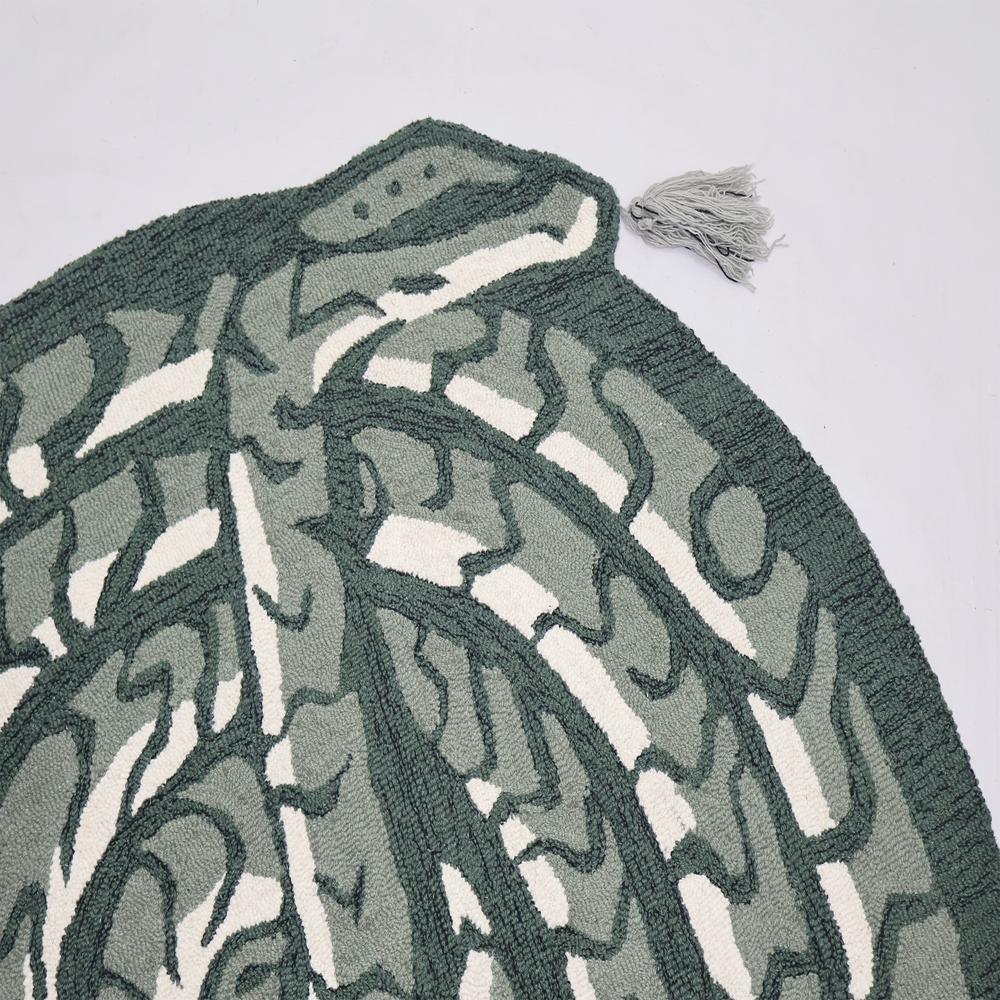 Handmade Round Green Snake Pattern Tufted Rug with Cream Accents and Decorative Tassels