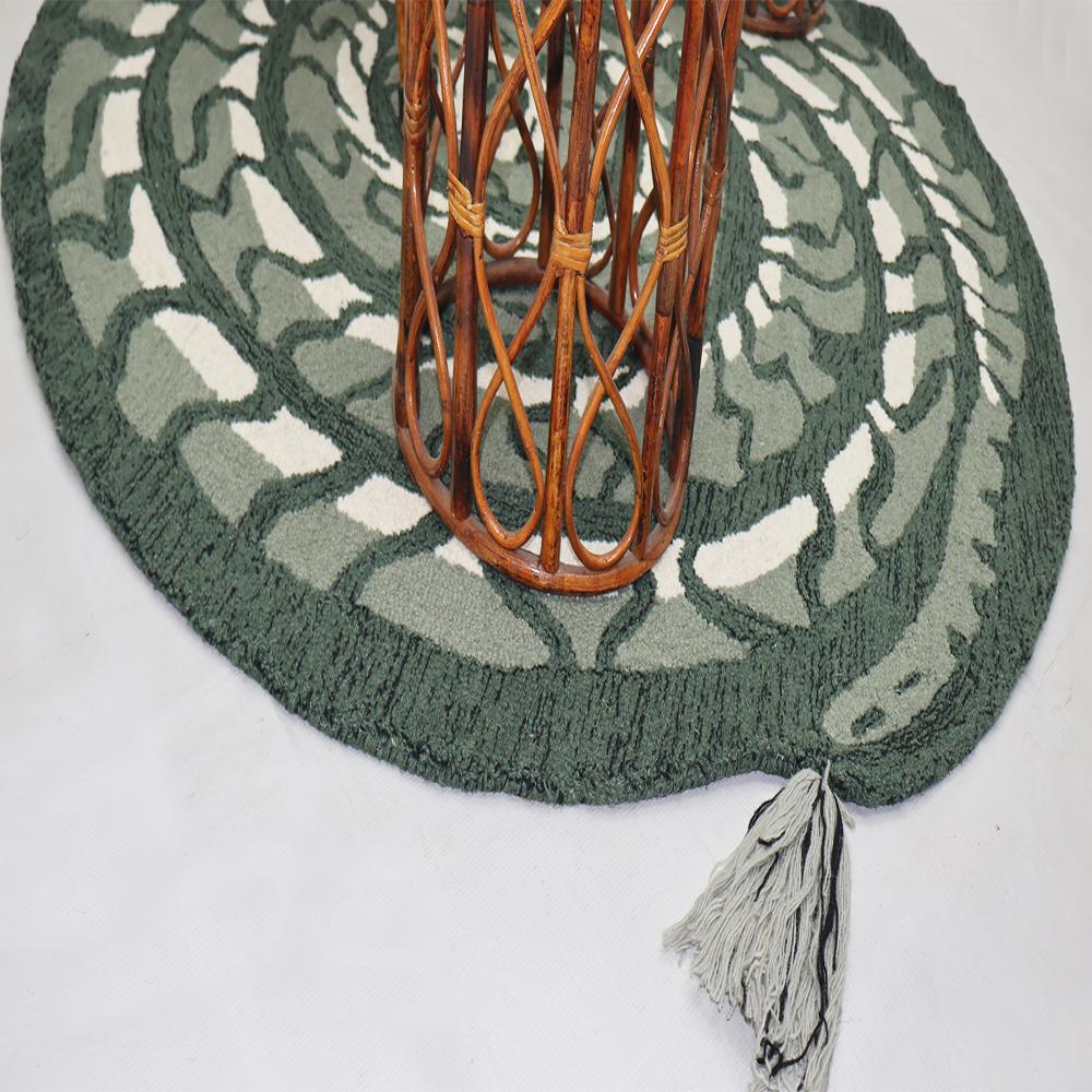 Handmade Round Green Snake Pattern Tufted Rug with Cream Accents and Decorative Tassels